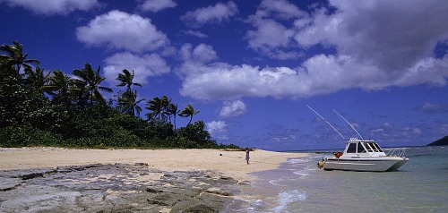 Fiji vacations - landing on a beach, Taveuni, Fij