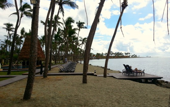 Elderly couple sitting on the 'couples deck' on Denarau Island Fiji