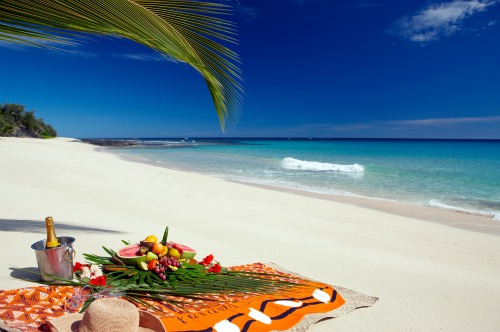 A romantic Fiji honeymoon experience. A beach picnic at Yasawa Beach & Spa, Fiji