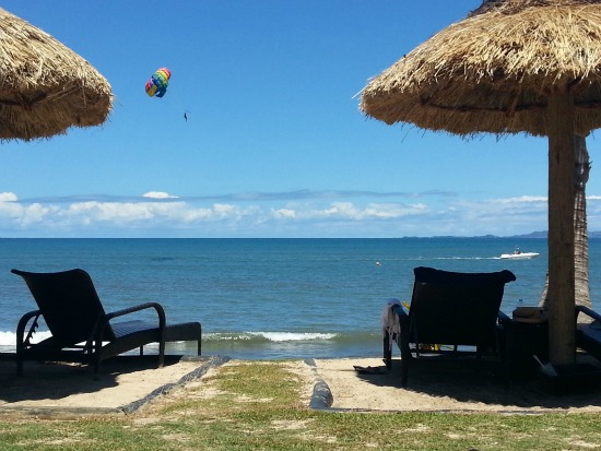 Parasailing in the distance on my Fiji vacation