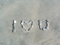Stay at a honeymoon resort Fiji then write this on the sand
