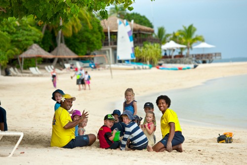 kids playing on the beach on Castaway Island, Fiji